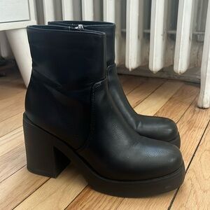 Black platform heel boots